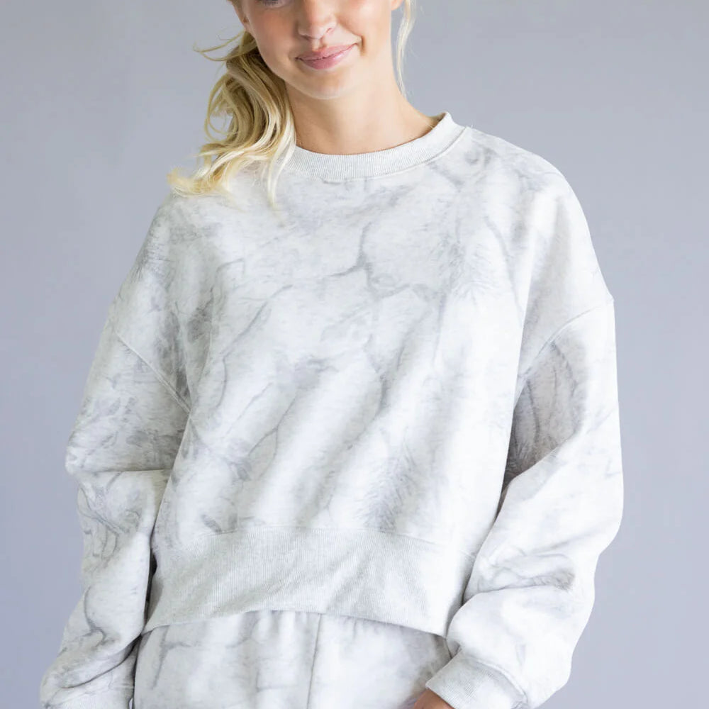 white marble-textured sweatshirt